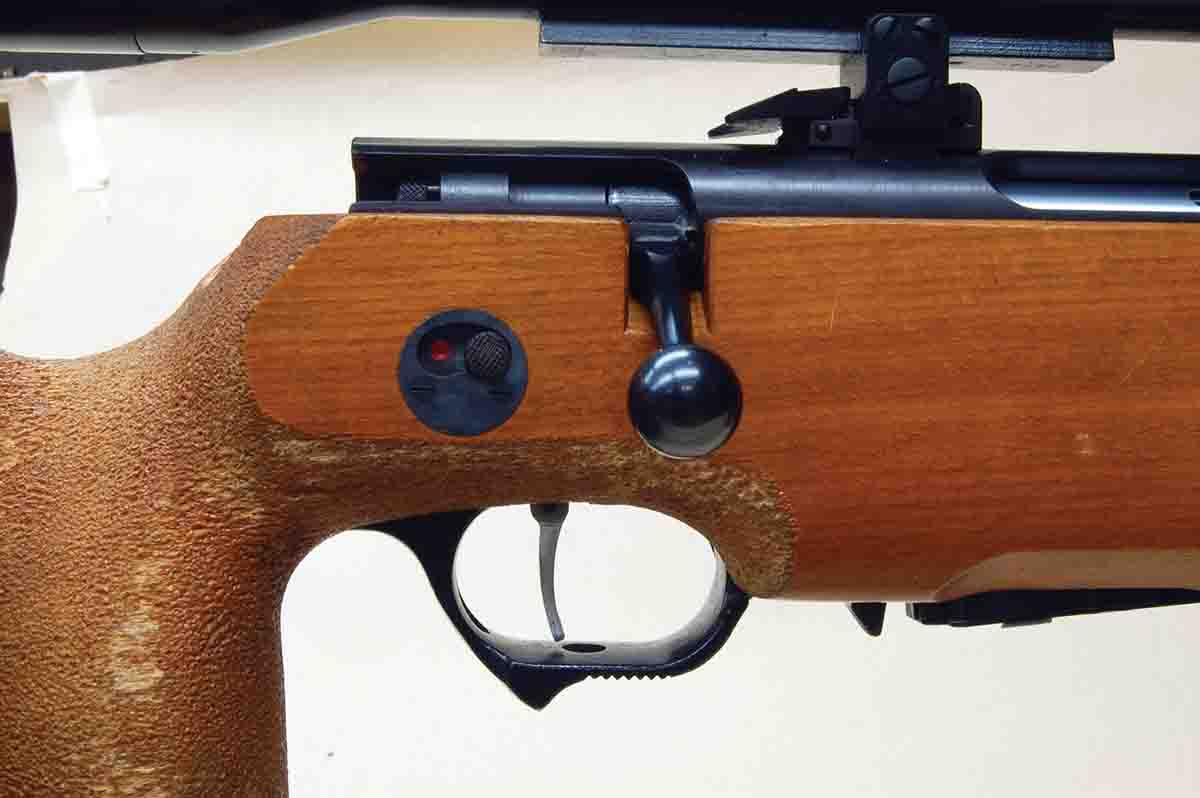 The shape of the grip, trigger and “hook” on the bottom of the guard of an unmarked rifle, seem to indicate a target rifle of some type.